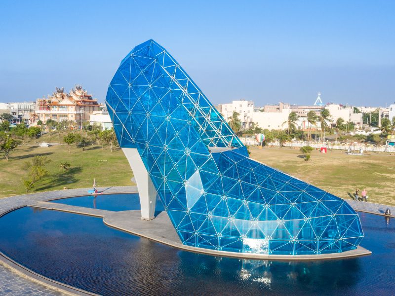 A glass church shaped like a giant high heel
