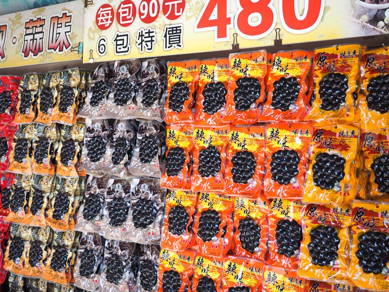 Rows of packages of iron eggs for sale in Tamsui