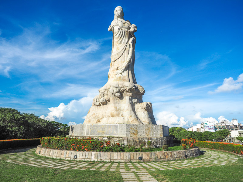 A giant white statue of Matsu, the goddess of the sea