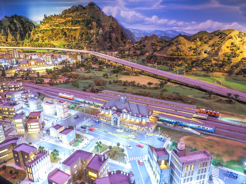 A model train going past places in Taiwan