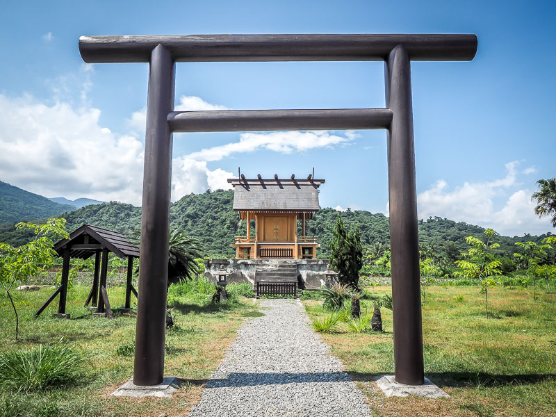 A shinto black gate with Japanese shrine in the countryside of Taiwan