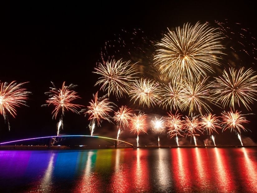 Fireworks being shot off from a bridge over a harbor in Penghu, for the Pengu Fireworks Festival