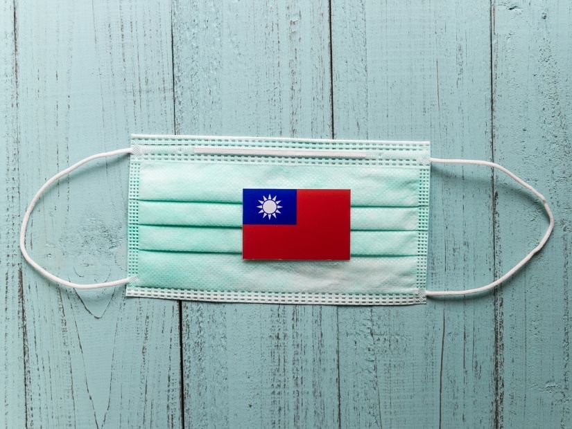 A mask with a Taiwan flag on it. One thing to be aware of if living in Taiwan is that mask wearing is very common there.
